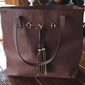 Leather and brass tote
