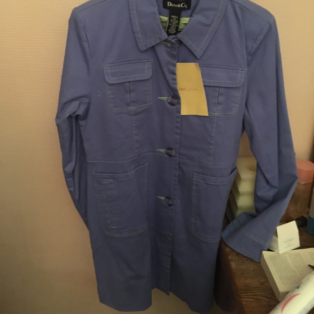 Trench coat style blue coat with green lining