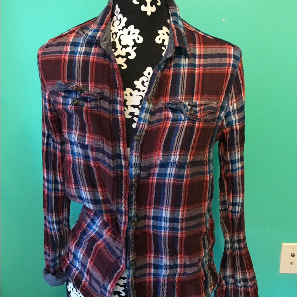 navy, orange, and maroon flannel
