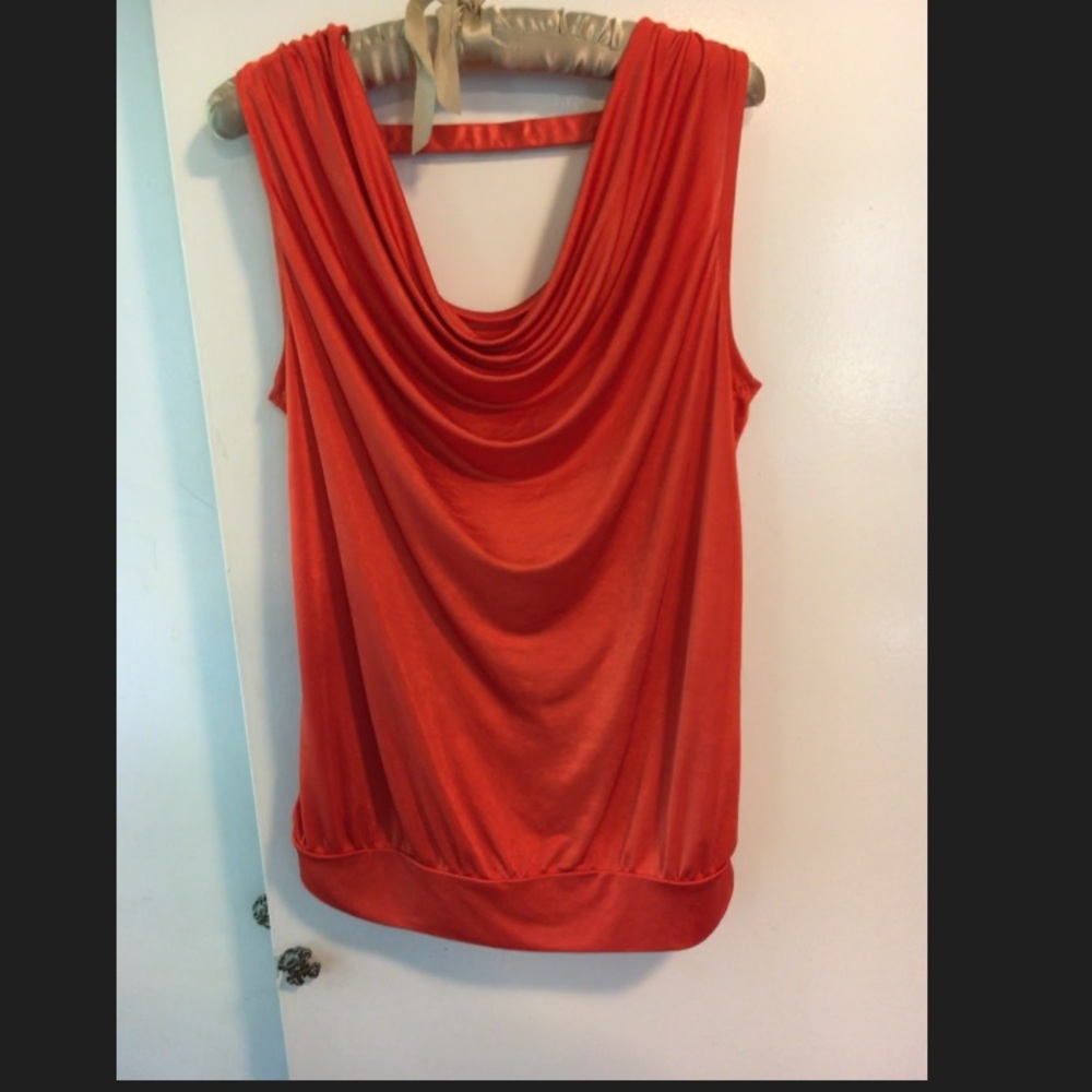 Orange, backless, going out shirt.