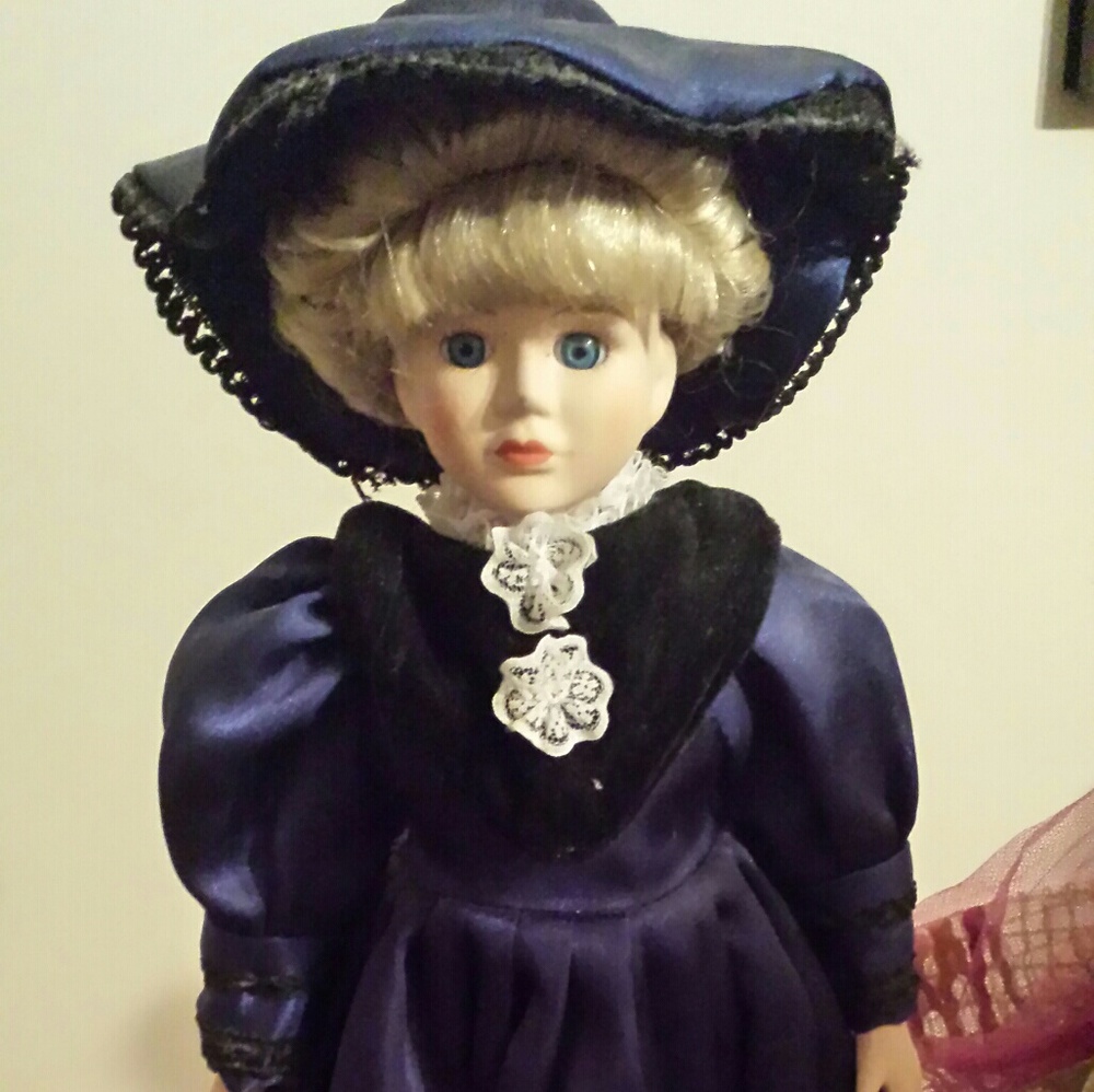 Blue eyed porcelain Priscilla doll