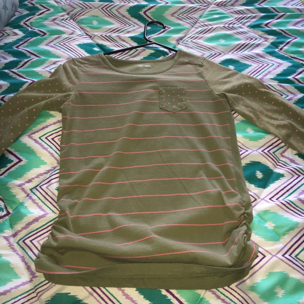 A black and green baseball tee like shirt