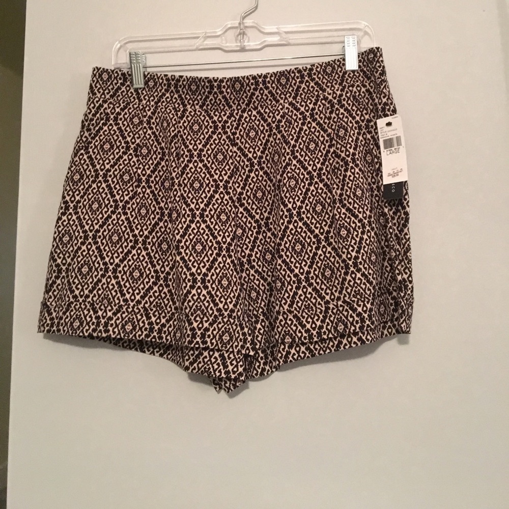 Tan and black shorts