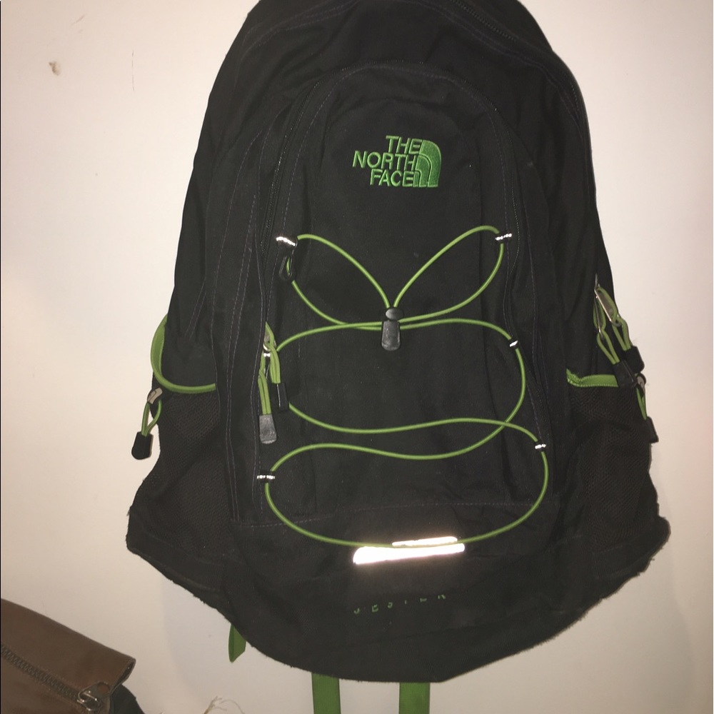 green and black north face backpack (jester)