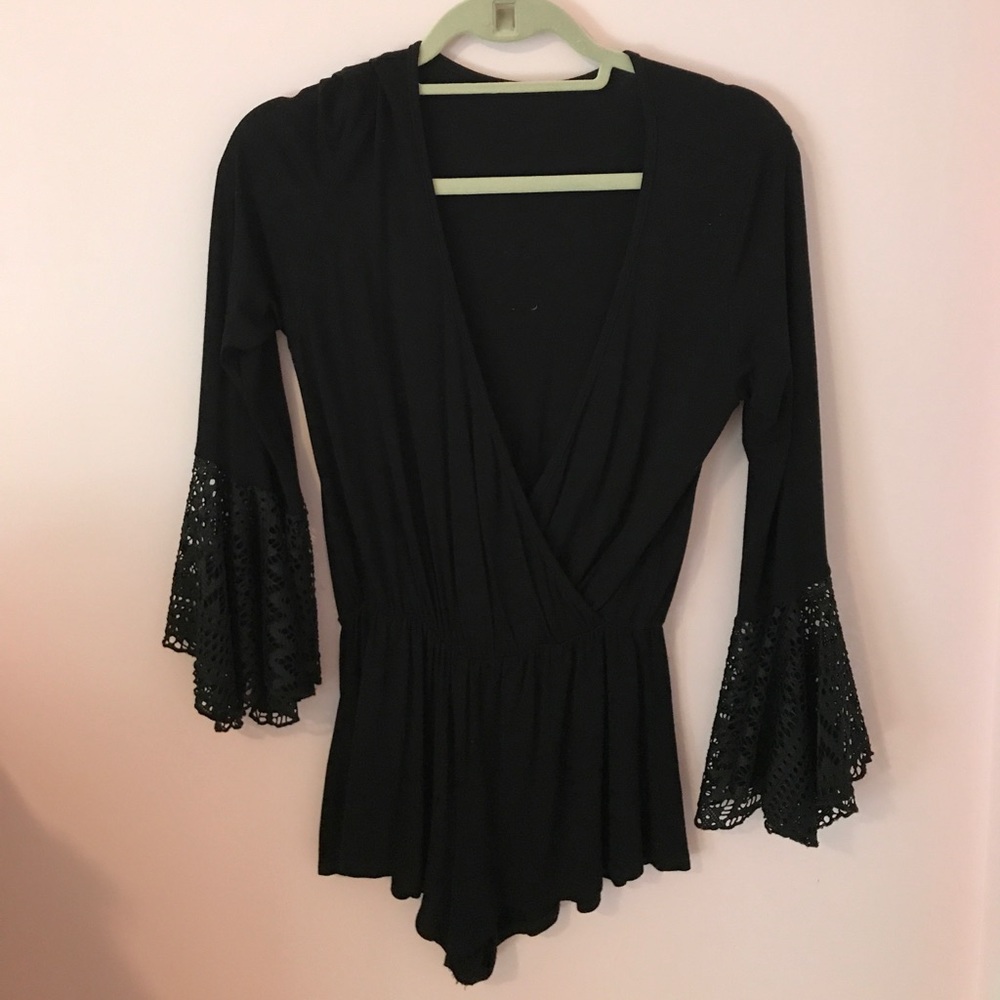 Short jersey black romper with long bell sleeves!