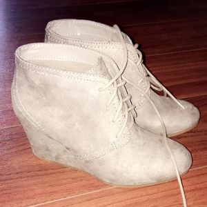 Taupe colored wedge booties