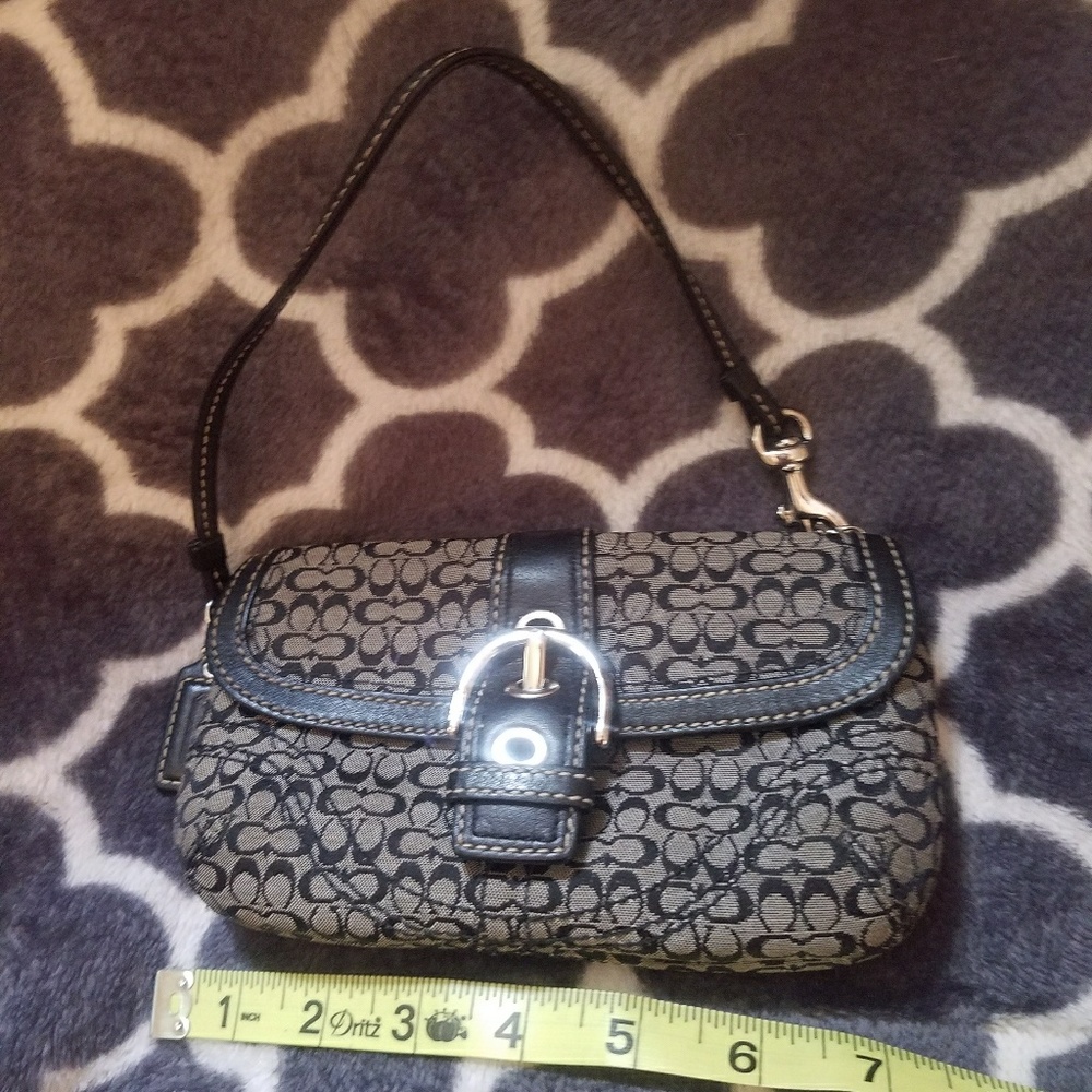 Small authentic Coach wristlet
