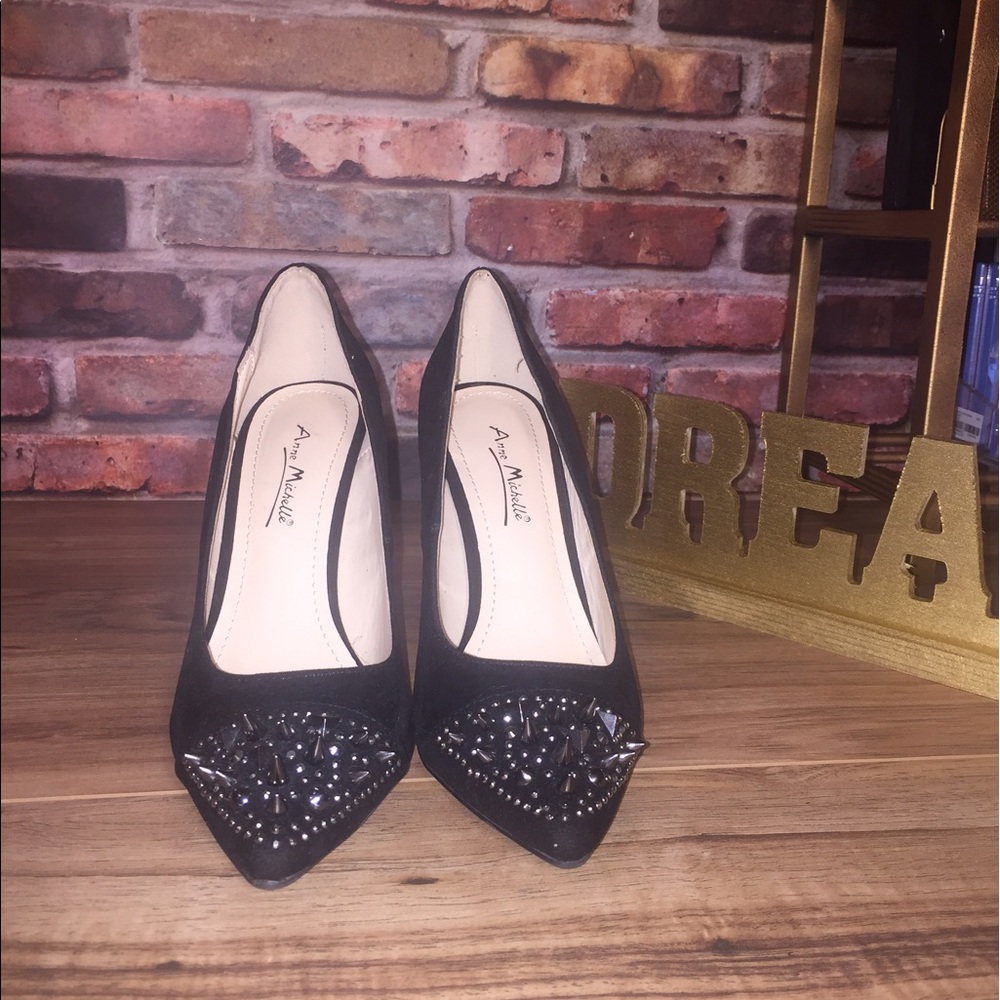 Black spiked toe heel