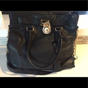 Michael Kors black leather lock and key bag