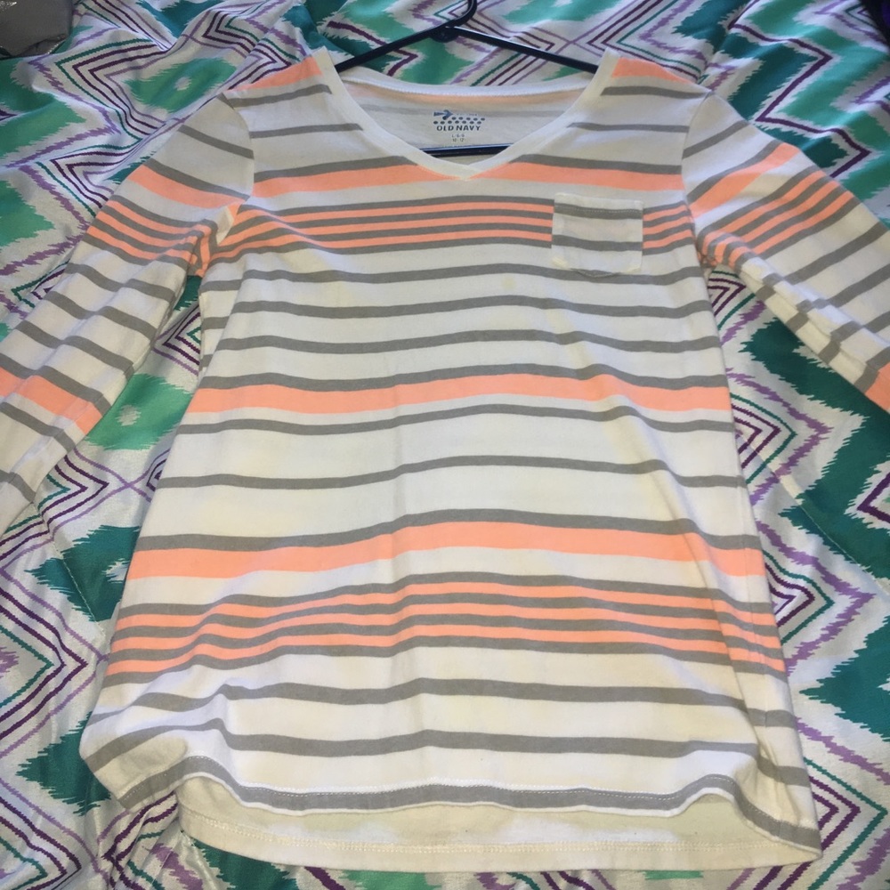 A Orange, grey, and white striped long sleeve