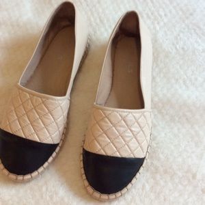 Cream and black quilted flats