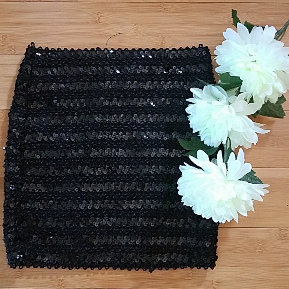 Sequined black mini skirt