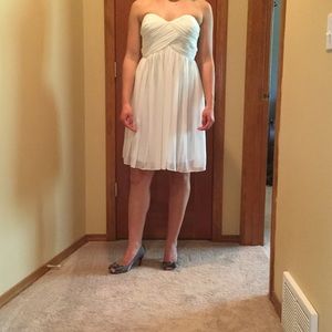 Light mint strapless Donna Morgan dress.