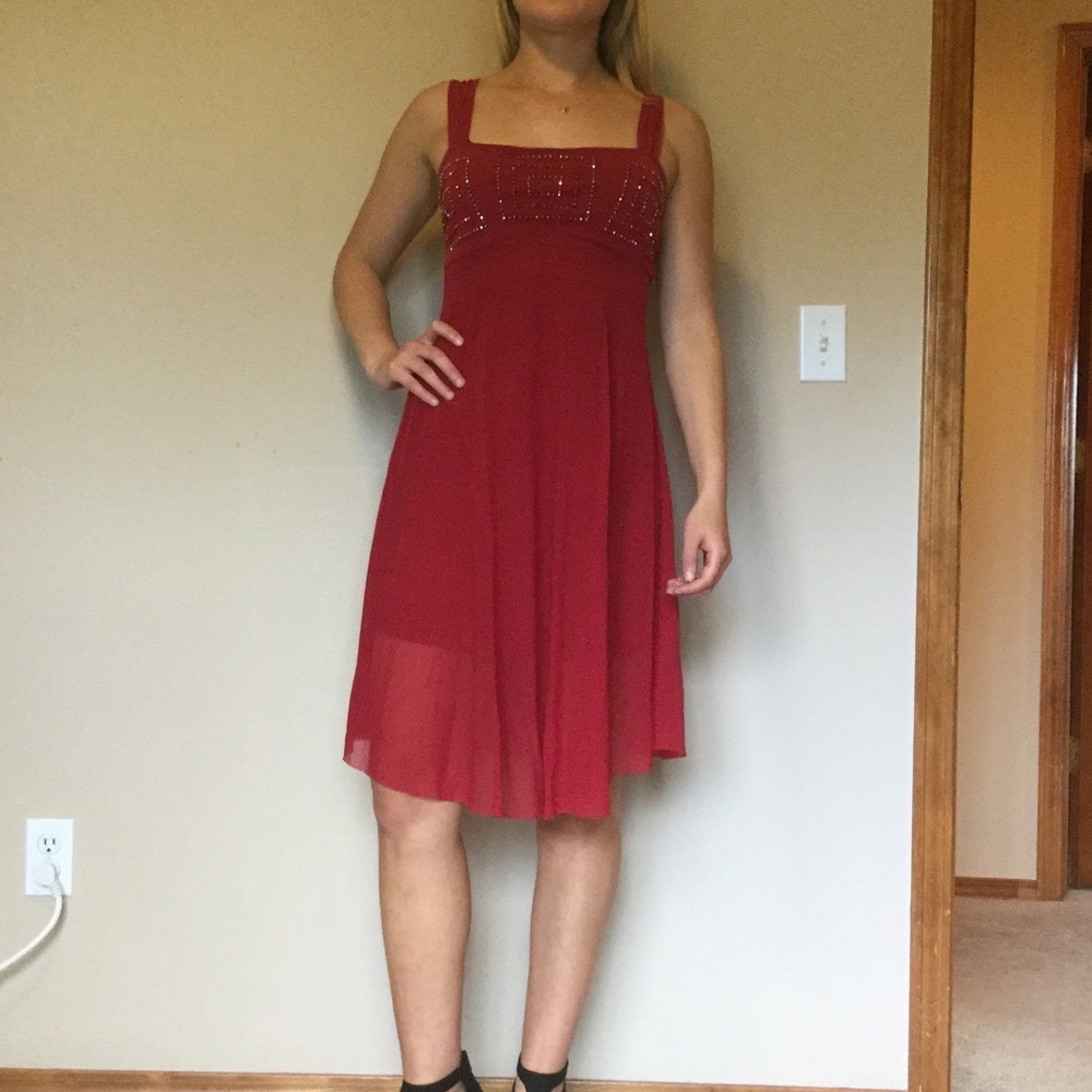 Red chiffon mini-midi dress.