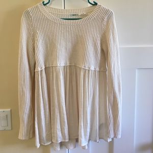 An off white sweater from Urban