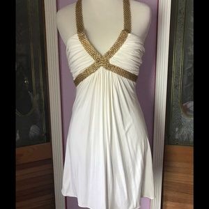 White with gold chain neck closure dress