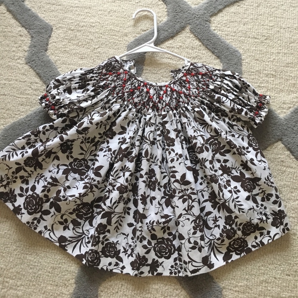 Smocked little girls swing top. Size 4T