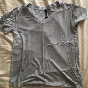 Tilly's v neck blue t shirt. BLUER IN PERSON