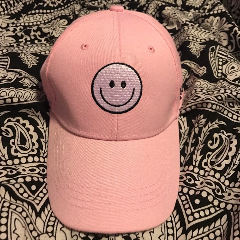 Pink smiley face hat