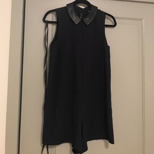 navy jumper with faux leather collar and belt