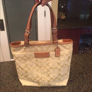 yellow classic print Coach purse