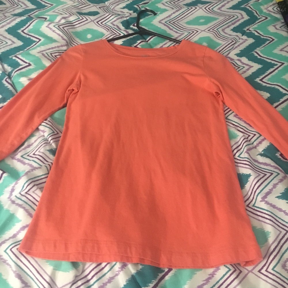 A Orange pink-ish Long sleeve tee shirt