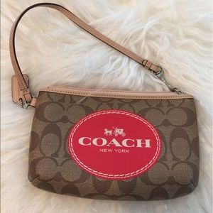 Coach mini purse with heritage red design