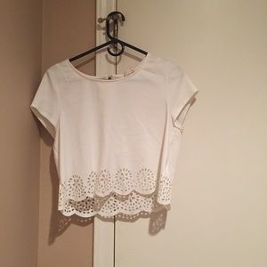 White shirt with cutout on bottom