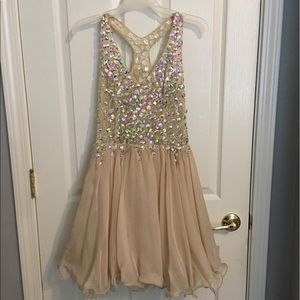 Short, nude, beaded formal dress, size 6.