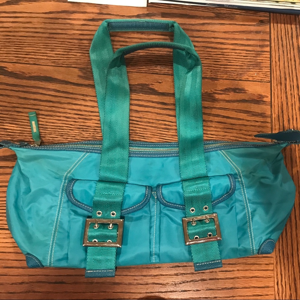 Un Apres Chien Shoulder Bag