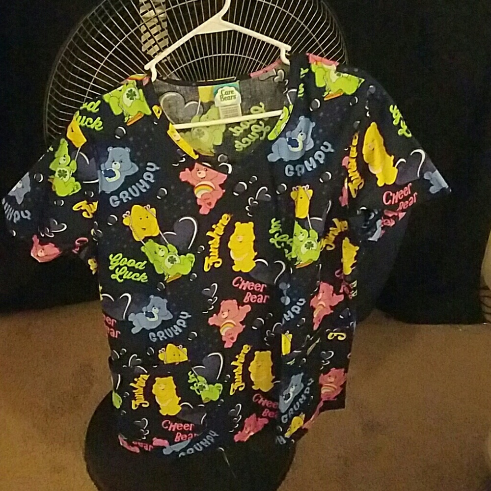 Care bear scrub top. Never worn. Still has tags.