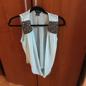 Light blue sheer and Sequence vest