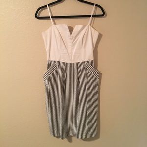 Strapless dress with gray and white striped bottom