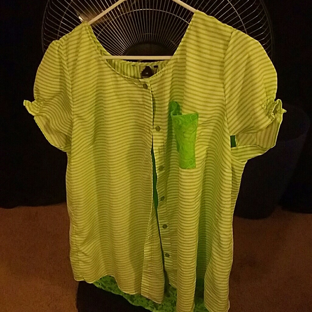 Green button down shirt. Lace down the back.