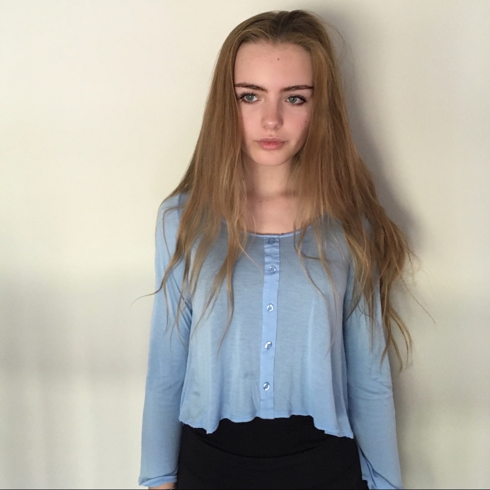 Baby blue bell-sleeved top