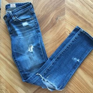 AG distressed ankle jeans.