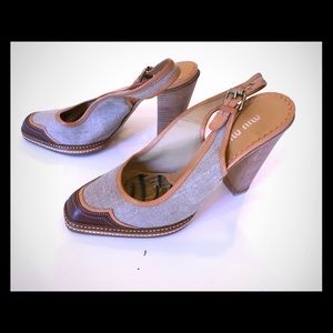 Canvas slingback heels with leather trim.  Miu Miu