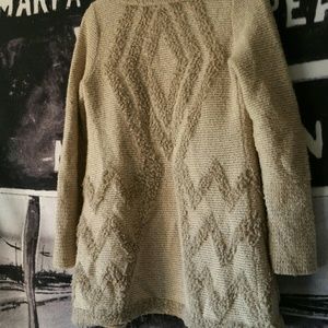 Small Angel of The North Anthropologie sweater