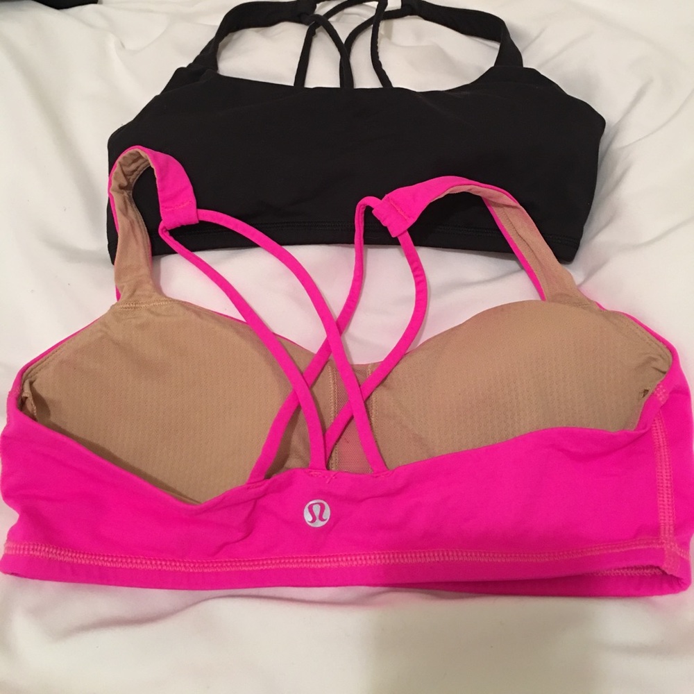 Pink and black Lululemon sports bras