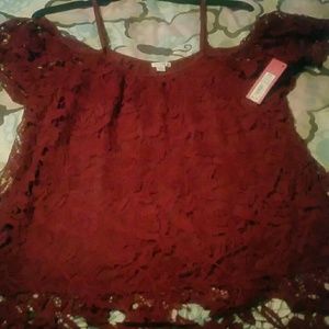 Beautiful burgundy lace overlay cold shoulder top.