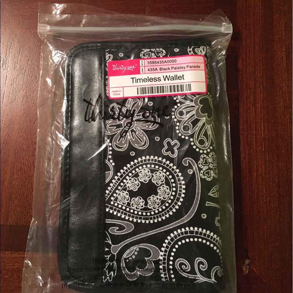 Black paisley parade wallet.