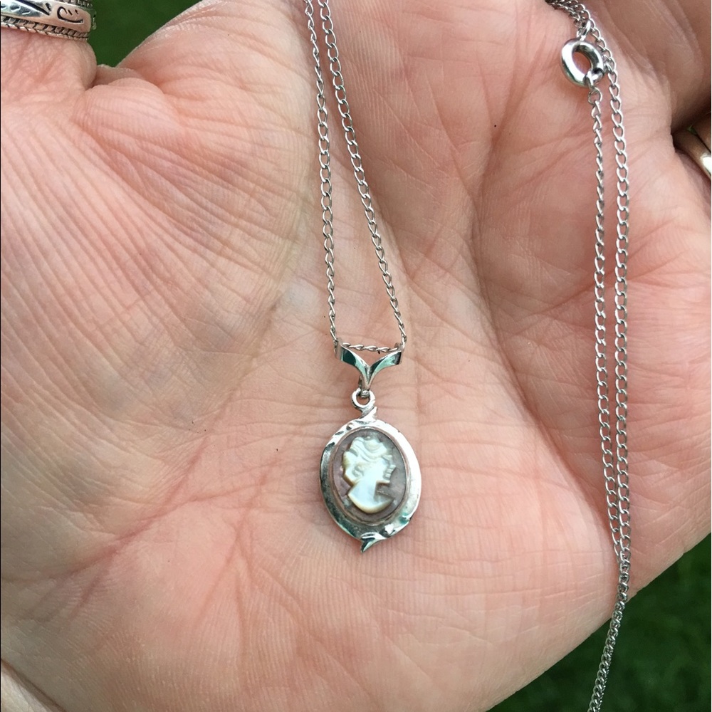 Pretty small cameo with silver trim
