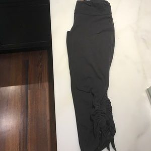 Cropped workout leggings cinched at the bottom