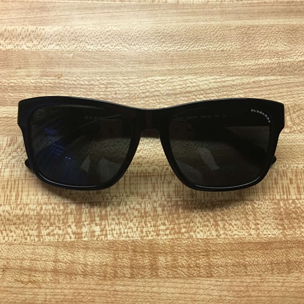 Burberry Authentic sunglasses/ Dark black lenses.