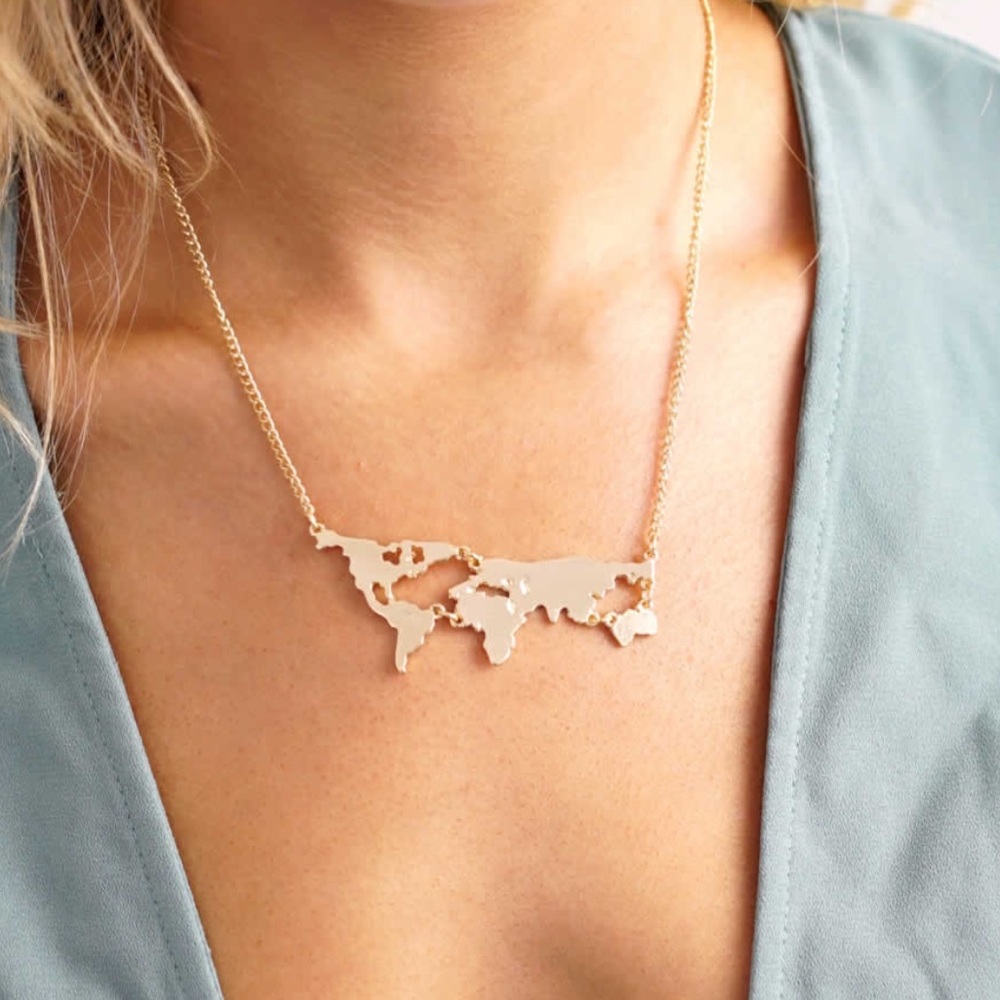 Gold plated world map necklace