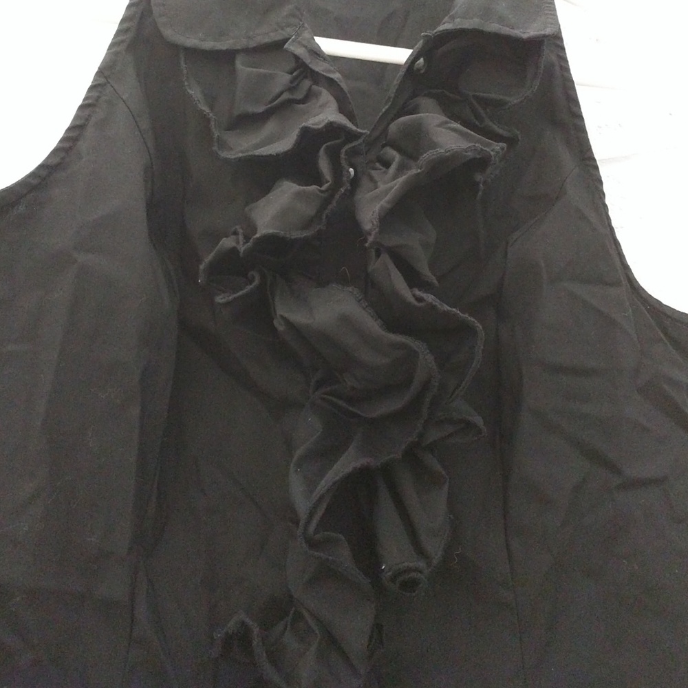 Ruffled black top
