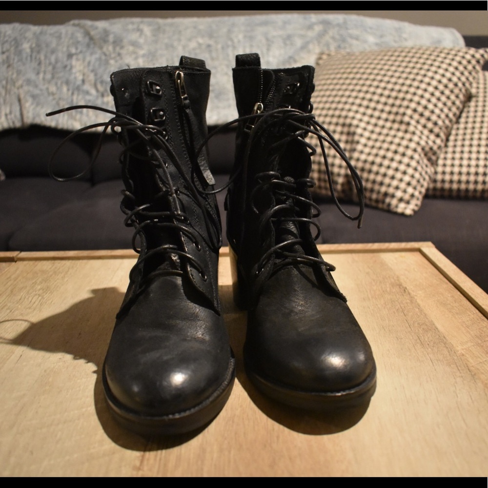 Black Kenneth Cole Combat boots.