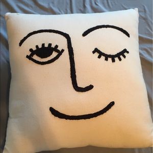 Three Urban Outfitter pillows.