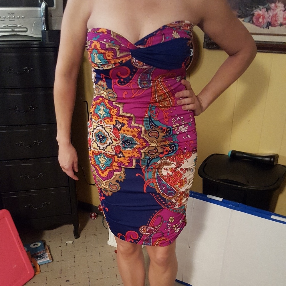 A flattering roush multi colored dress