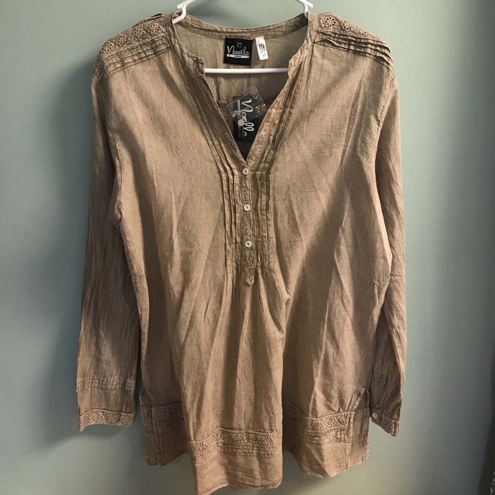 Champagne colored boutique style blouse.